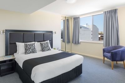 King bed in Two Bedroom Apartment at Nesuto Hotels