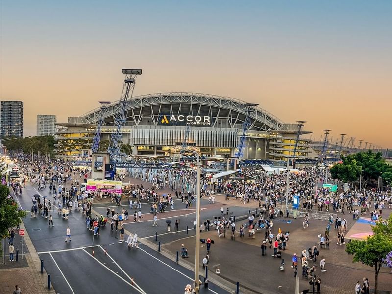 Distant view of the crowded Accor Stadium near Pullman Sydney Olympic Park