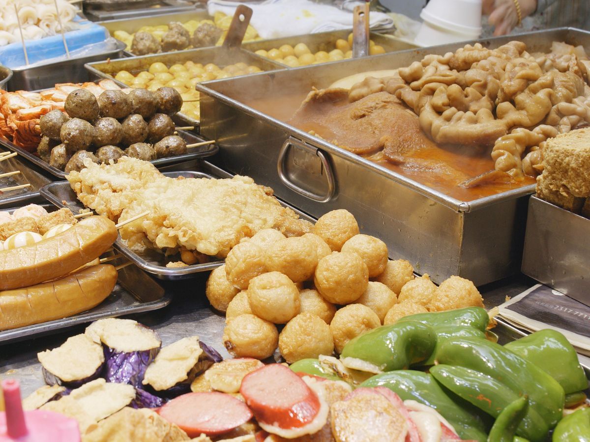 Close-up of a buffet arranged in a street food at Park Hotel Hong Kong