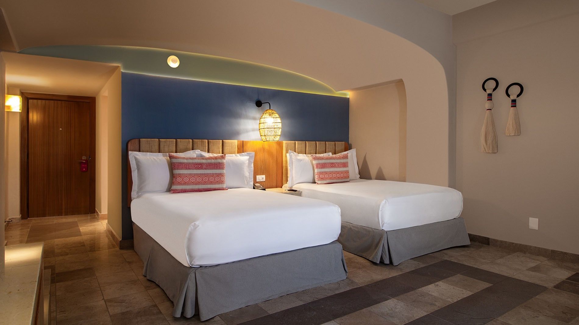Ocean View 2 Double Deluxe Superior with cozy beds, blue accent wall & woven pendant lamps at Camino Real Acapulco Diamante