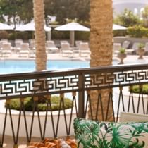 Pool front dining area in Giardino at Palazzo Versace Dubai