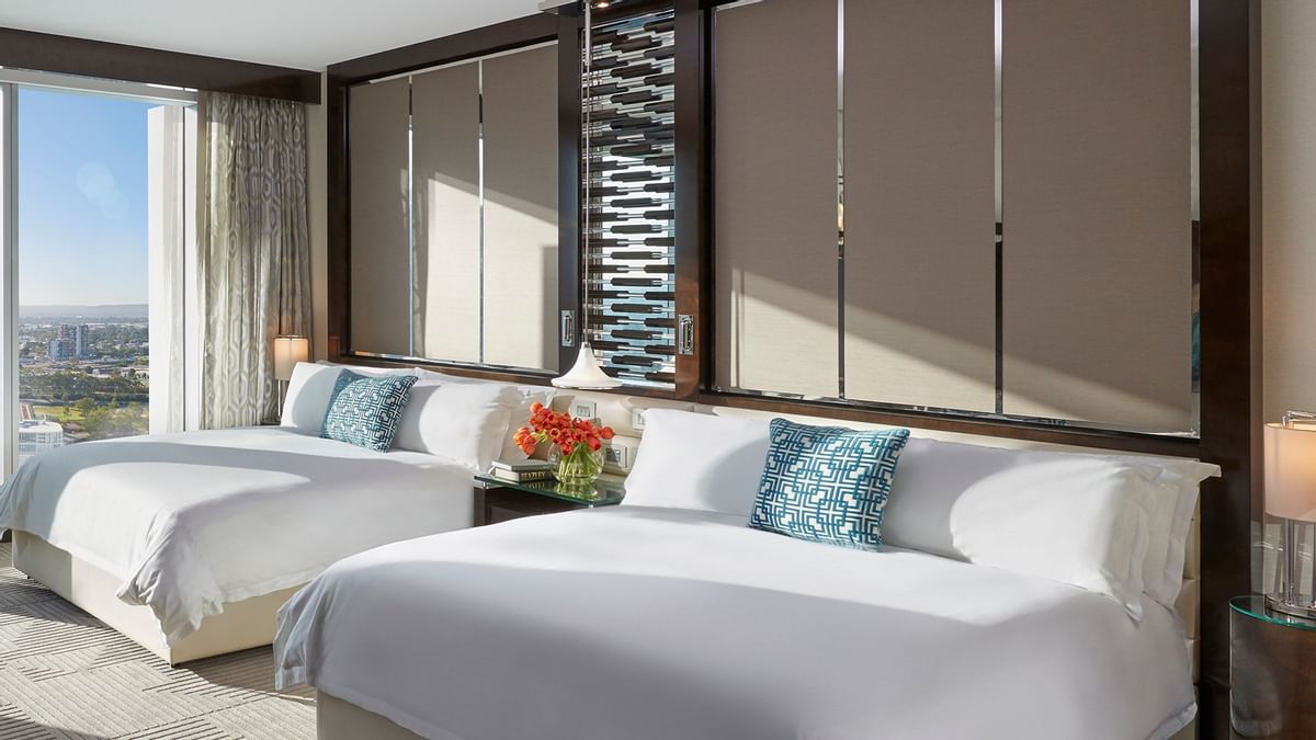 Bed & furniture in Deluxe Accessible Twin Room at Crown Hotels