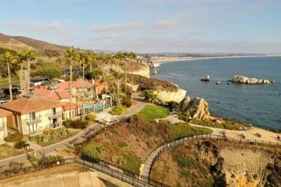 Aerial view of oceanfront path grass and pool