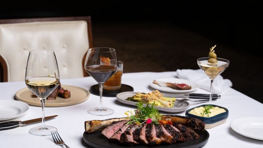 An assortment of dinner and cocktails from our modern steakhouse, Diplomat Prime.