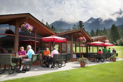 People enjoying outdoor dining in Mountainside Grille at Fairmont Hot Springs Resort