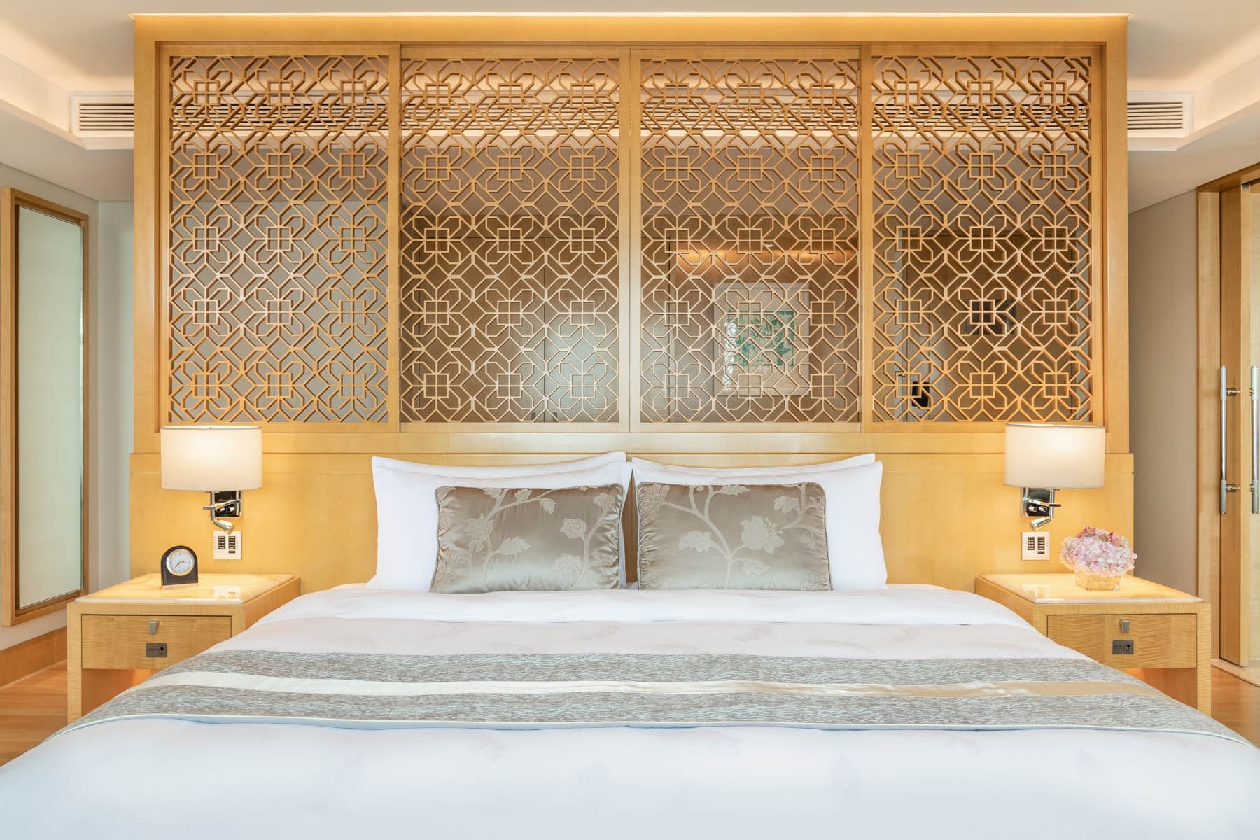Bed in Club Deluxe room at White Swan Hotel