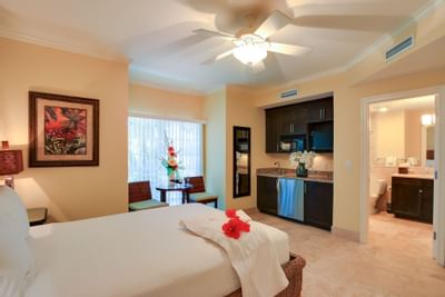 Comfortable bed in Studio Room at Windsong Resort On The Reef