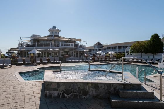 Outdoor swimming pool and hot tub at Anchorage By The Sea