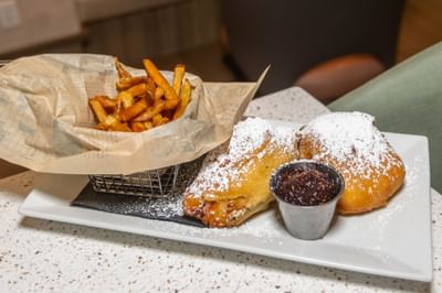 Monte Cristo with Funnel Cake-Batter and Raspberry Preserves