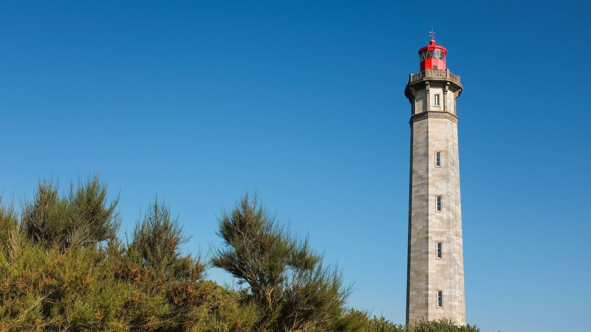 View of Phare Des Baleines Lighthouse near the Originals Hotels