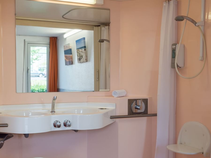 Bathroom vanity in bedrooms at Hotel Recouvrance