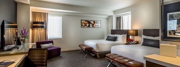 Interior of Double Queen Bedroom at The Godfrey Chicago