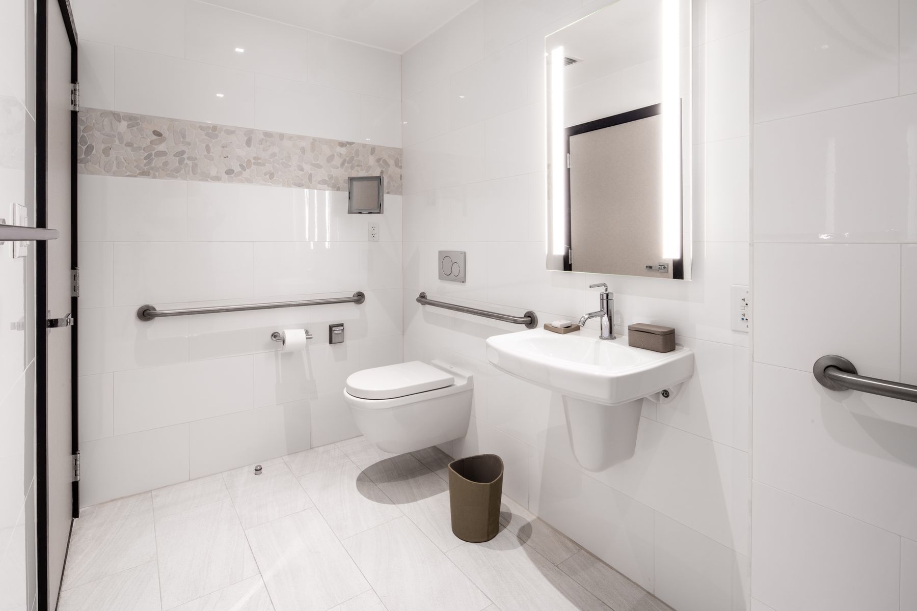 A clean and modern bathroom with accessible features