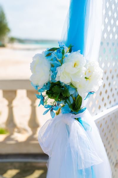Close-up of wedding arch with flowers set-up for a wedding at Dover Beach Hotel