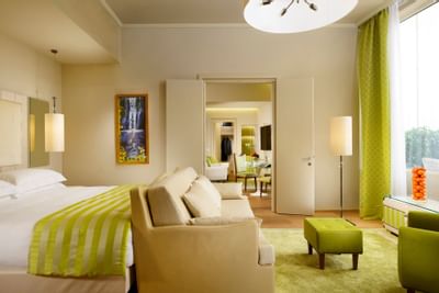 Bedroom with a living room at Grand Hotel Minerva