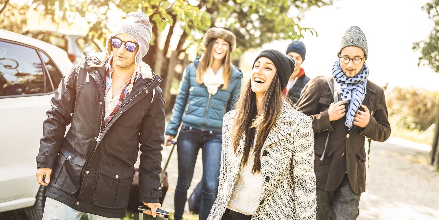 Group of friends hanging out near Coast Hinton Hotel