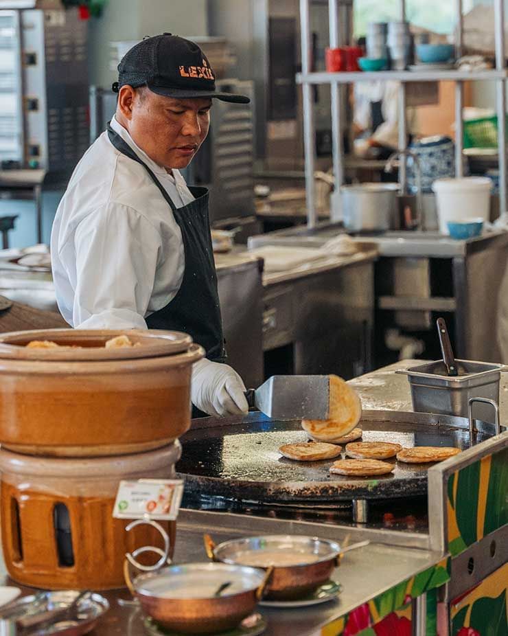 chef preparing food for a half-board holiday meal