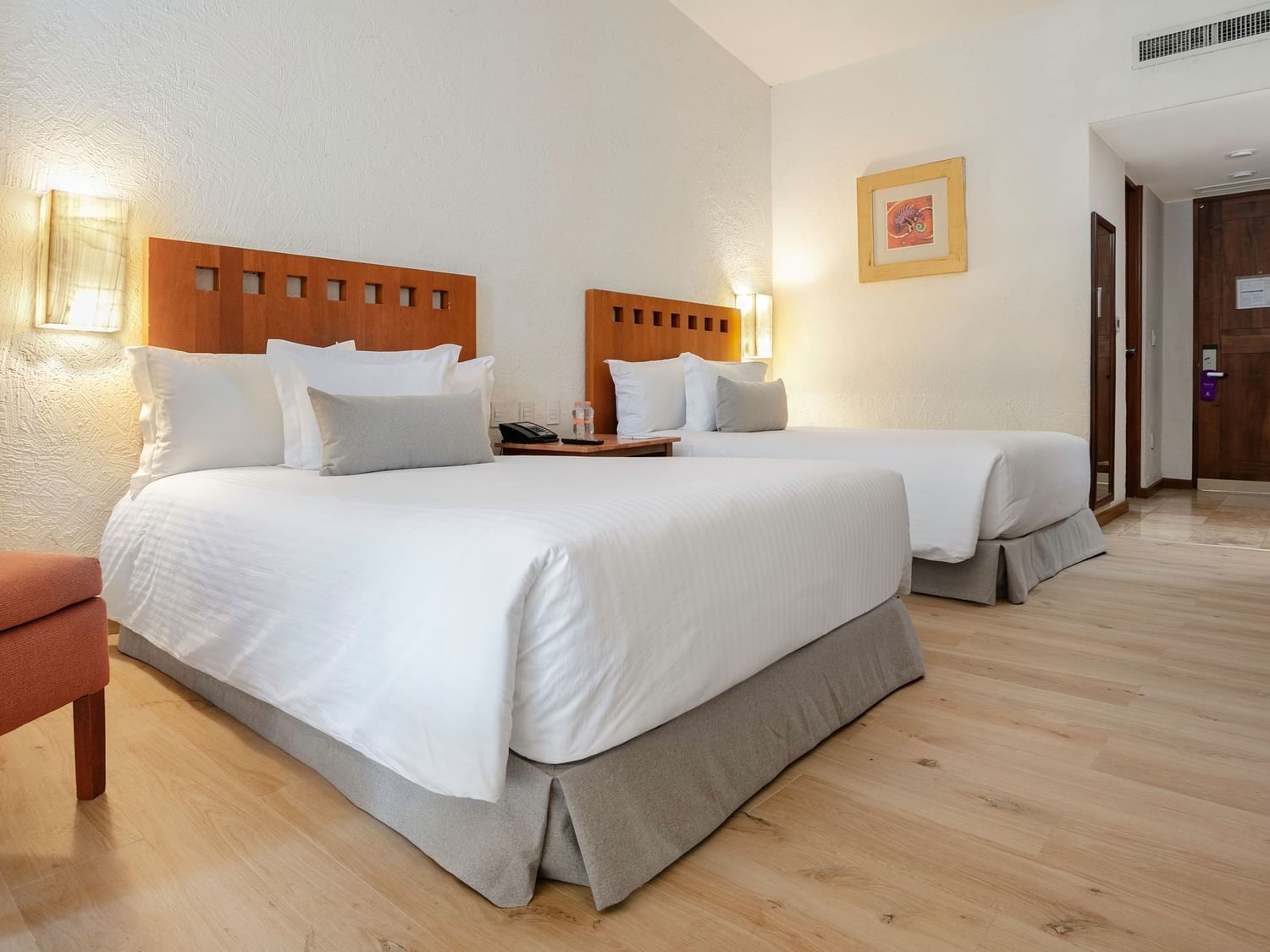 Interior of King Viceroys Suite with two beds at Camino Real Guadalajara in Zapopan