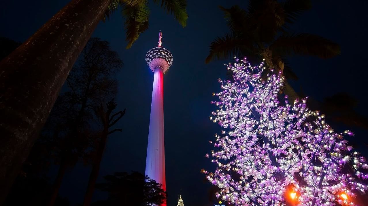 Low-angle view of KL tower at night near Sunway Resort Hotel