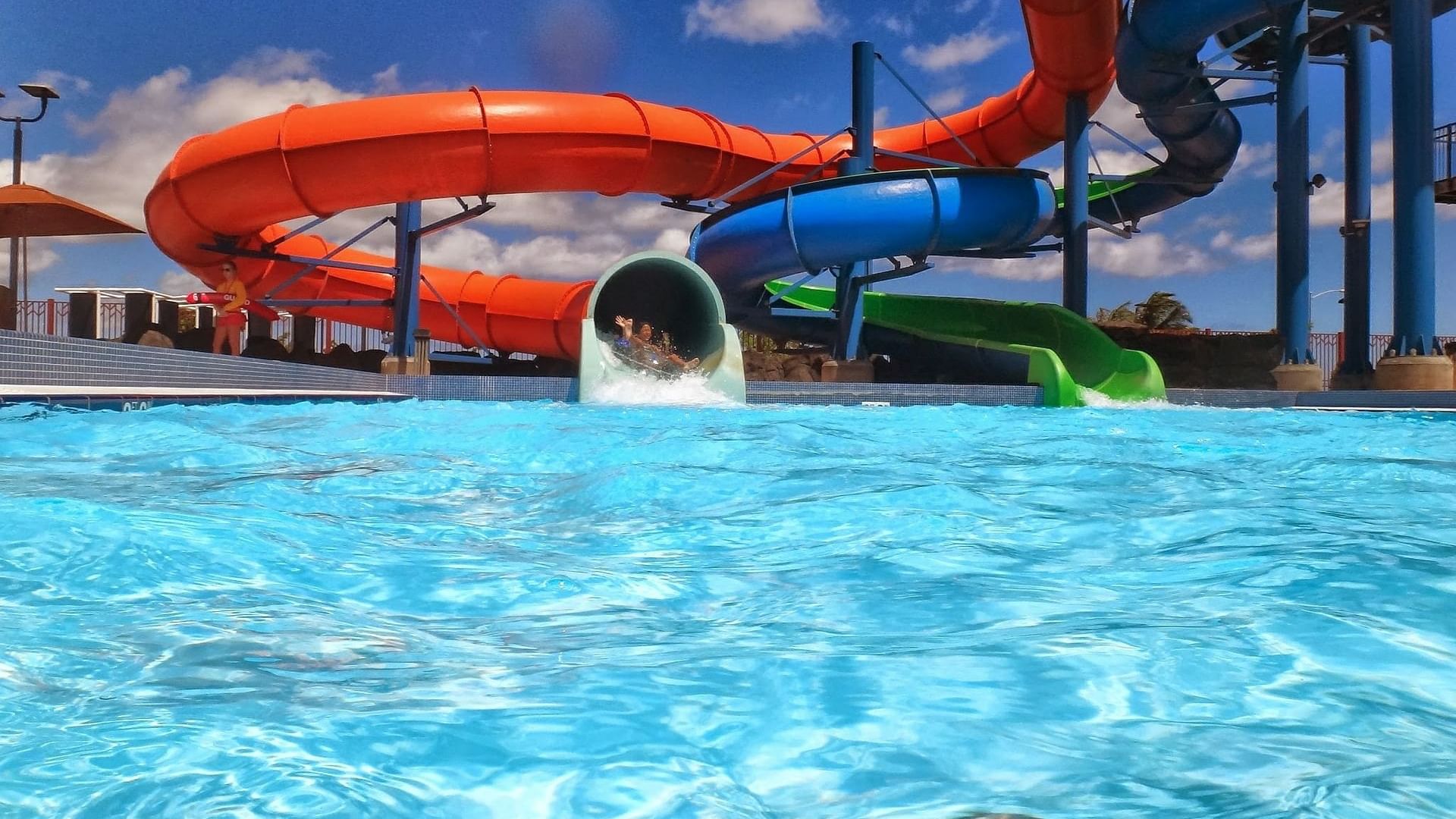 Leisure area with swimming pool at The Originals Hotels