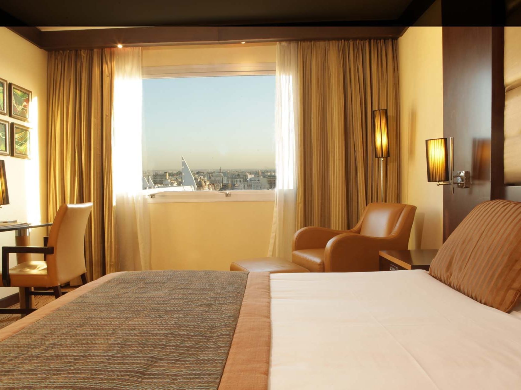 Large Bed with beautiful Window View - Farah Casablanca Hotel