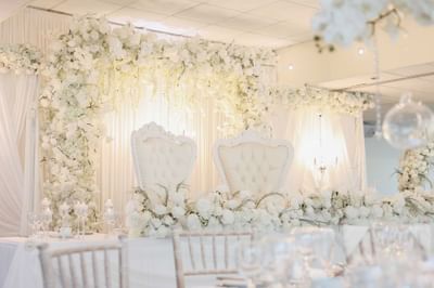 Chairs placed on a stage for the newlyweds at Orsett Hall Hotel