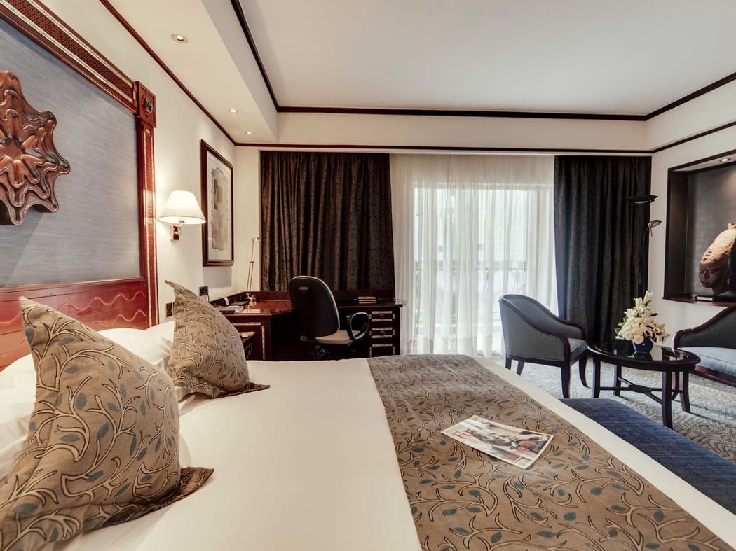 King bed in Deluxe Room at Kampala Serena Hotel