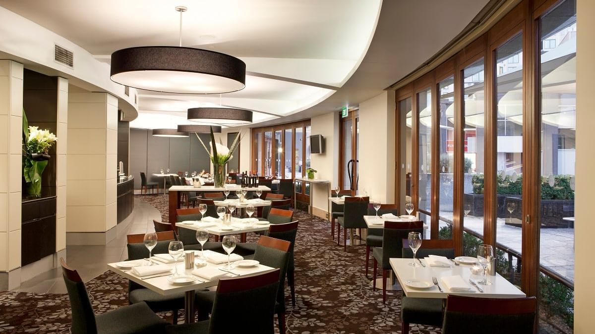 Indoor dining area in Jarrah Bar & Terrace at Quay West Suites Melbourne