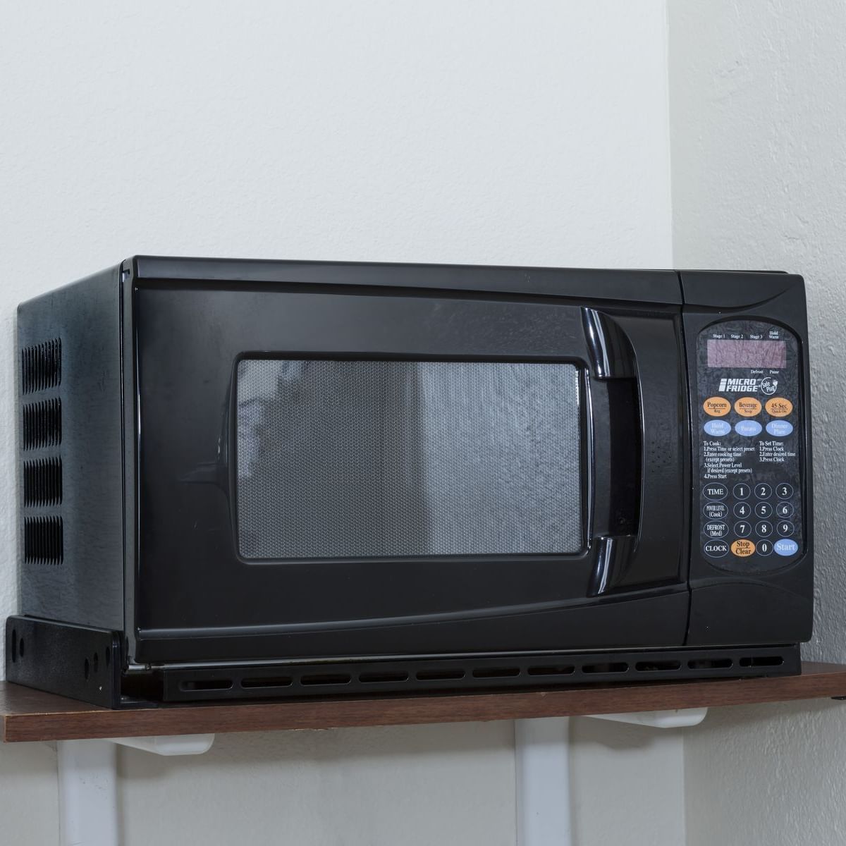 Closeup of a Microwave oven at Flamingo Express Hotel
