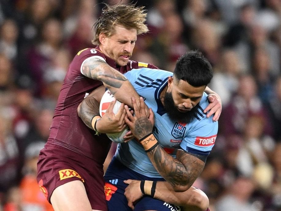 Rugby players in action during State of Origin 2026 - Game 1.