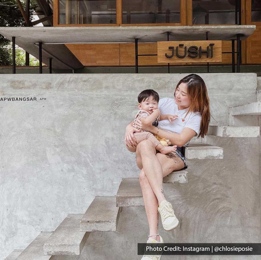 Mother & kid posing in the stairway at APW Bangsar near Imperial Lexis best Malaysian Restaurants Kuala Lumpur