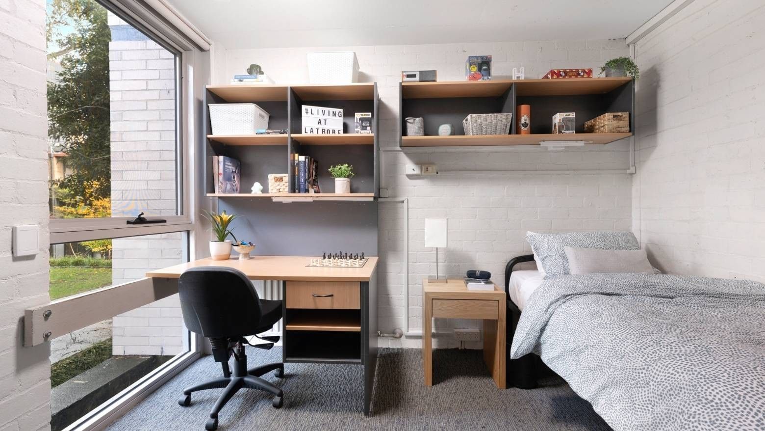 Comfortable single room with desk and bed at La Trobe University – Menzies College.