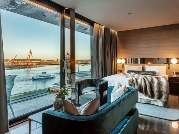 Luxury hotel room at Hotel Riverton Gothenburg with panoramic harbour view and premium interior