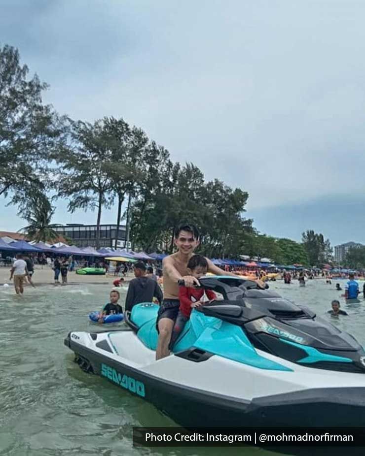 father and son riding a waterski together