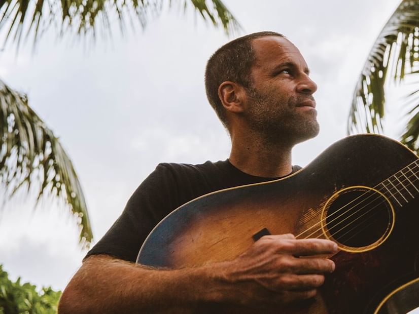 Jack Johnson playing the guitar
