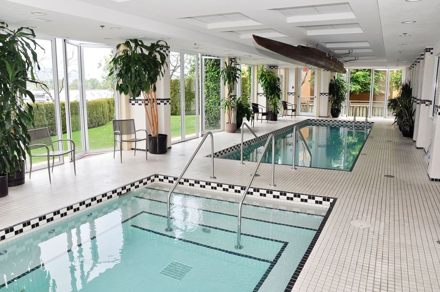 Indoor pools with outdoor garden view at Hotel Eldorado