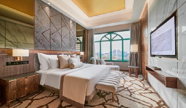 Comfy bed & TV in Sunway Grand Suite at Sunway Resort