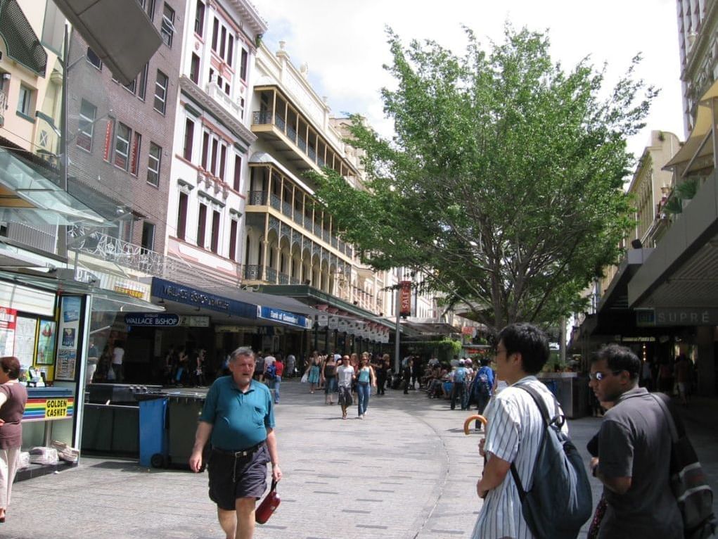 People walking on Queen street mall near George Williams Hotel