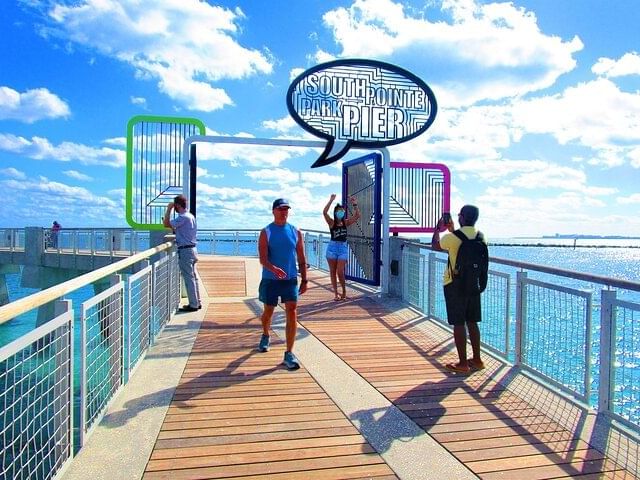 Guests enjoying South Pointe Pier view near Esme Miami Beach