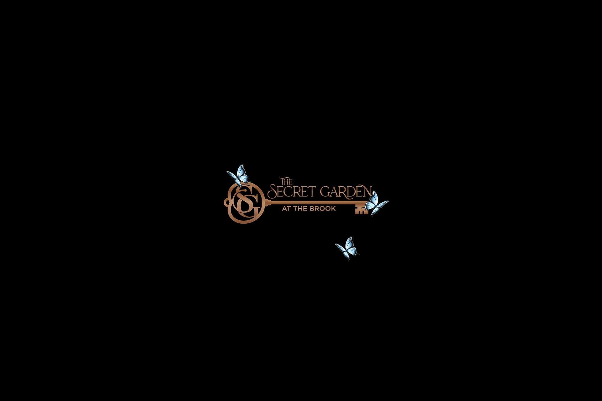 Key logo with blue butterflies floating around text reading The Secret Garden at The Brook