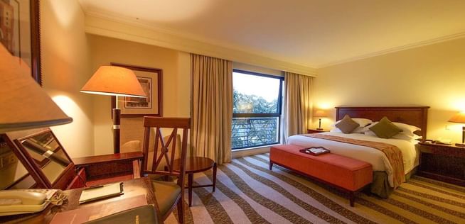 Interior of Junior Suite with one bed at Kigali Serena Hotel