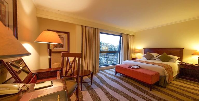 Interior of Junior Suite with one bed at Kigali Serena Hotel