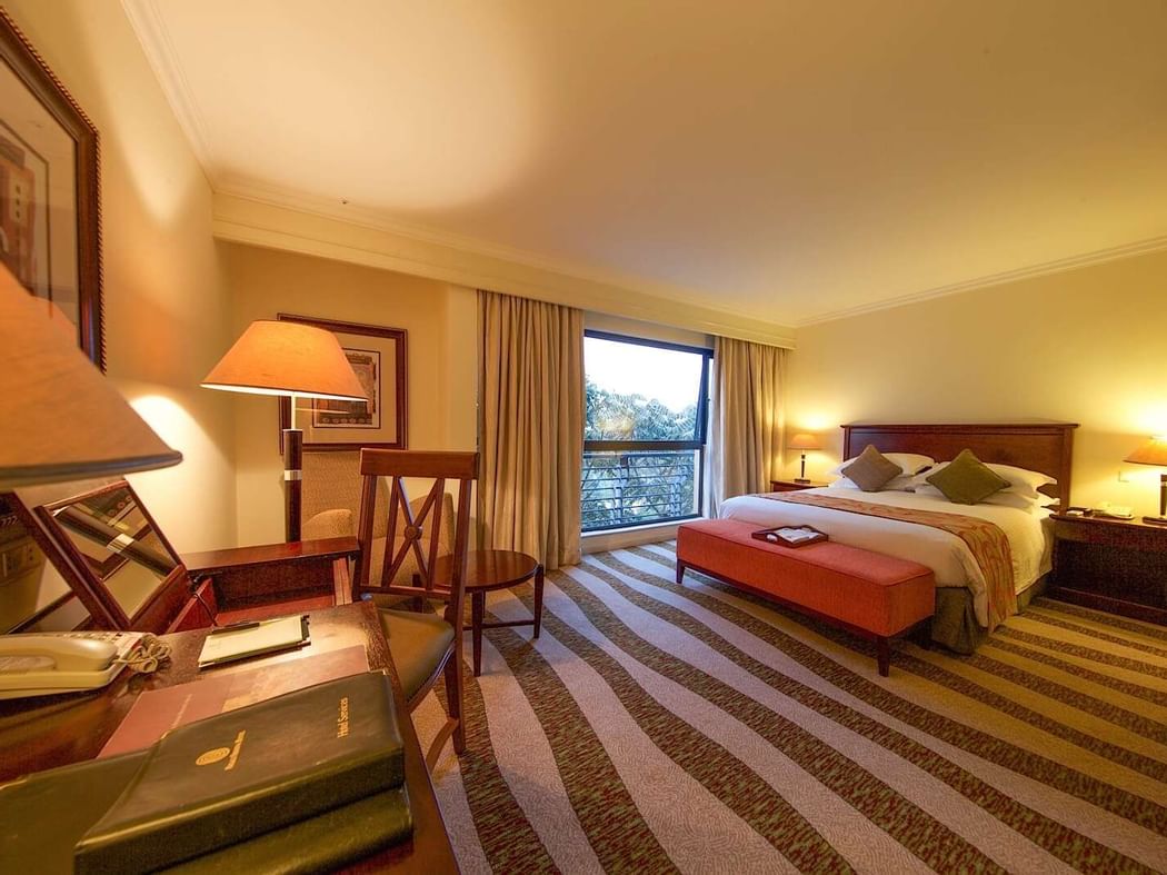Interior of Junior Suite with one bed at Kigali Serena Hotel