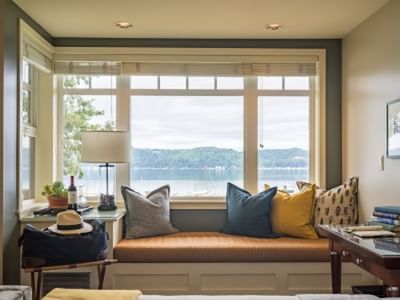 Window lounge overlooking the lake in Waterfront Queen at Alderbrook Resort & Spa