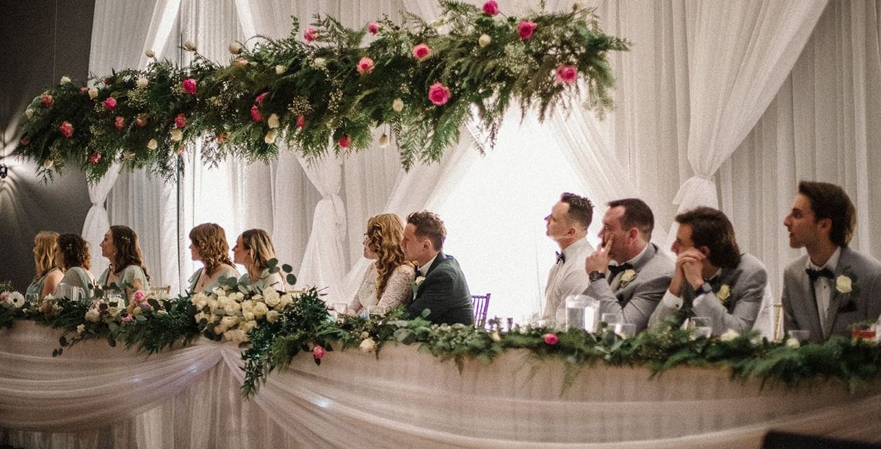 Bride and groom and wedding guests
