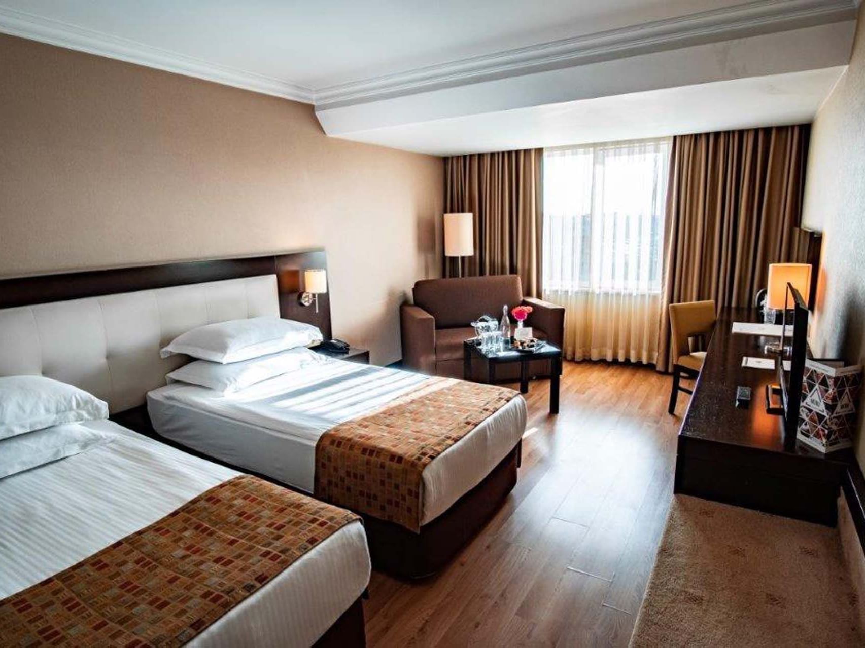 Twin Beds, Double Fun. Eresin Topkapi Standard Room: Explore Istanbul's vibrant culture with a friend.