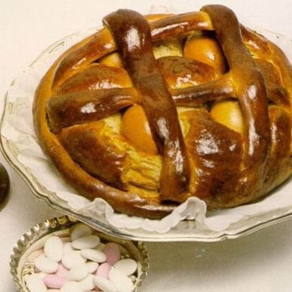 Traditional Portuguese Easter Folar bread served on a white plate at Huntingdon Manor