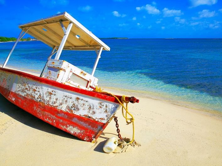 Fishing boat stranded in Oistins Fish Fry near The Abidah Hotel