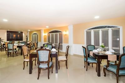 Dining table set-up in Le Manoir Restaurant at Le Manoir Bogotá Hotel