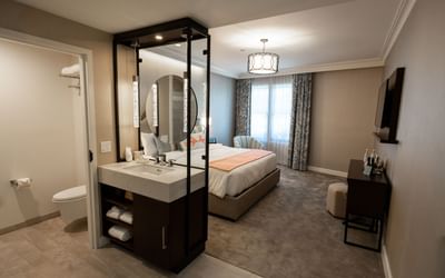 King-size bed, vanity with a large mirror in Avalon King at Atwater Avalon Catalina